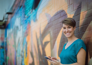 Woman on phone smiling